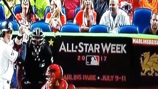 Public Display: Marlins Fan attempting to distract the other team's pitcher
