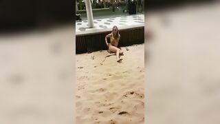 Girl rubs one out on the promenade