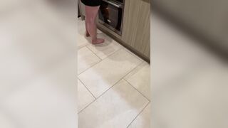 Husband Gropes Wife While She Is Cooking