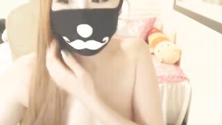 BJ Sharon wearing a black face mask with mustache takes off her panties and plays with her pussy until she squirts on the camera ???? - Korea