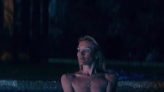 Celebrities: Nicky Whelan goes topless in the pool