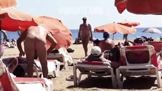 Humorous: Naked beachgoer packing some serious stovepipe
