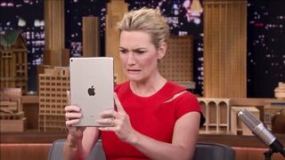 Kate Winslet and Jimmy Fallon watch a video of Kate getting facialized