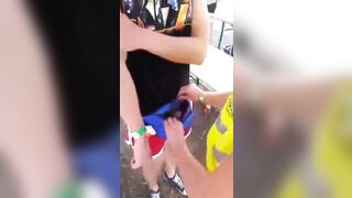 Humorous: female security checks boys fanny pack at a festival