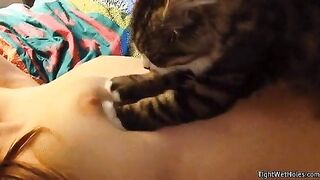 The Way this Cat Kneads that Boob