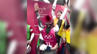 Alex Gough celebrating winning silver in luge team relay. - Olympic Games