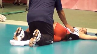 Olympic Games: Winifer Fernandez receives some aid stretching