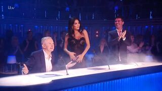 On Stage: Nicole Scherzinger motorboating Louis on X Factor