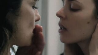Rachel McAdams passionately kissing Rachel Weisz
