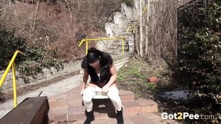 European babe releases a powerful stream of her golden pee outdoors - Pee