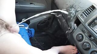 Pee: Hairy gal pees a flood in her bf's car
