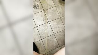spraying down the restroom floor - Pee